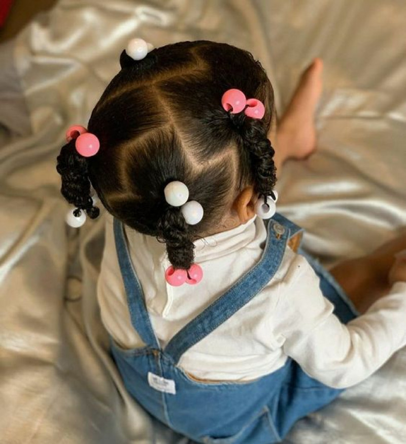 twisted black pigtails medium-length hair