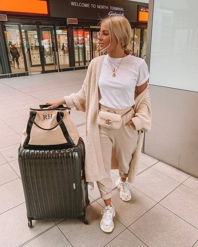 wear on long haul flight, hong kong international airport, waste containment, travel itinerary, luggage and bags, waste container, flight length, air travel, beige casual trouser, white trainer