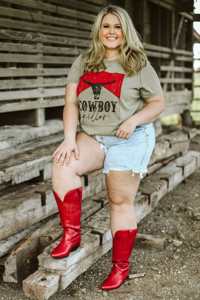 photograph, glitzy girlz boutique, cowboy red boots, beige t-shirt, light blue denim short, red ladies high boot