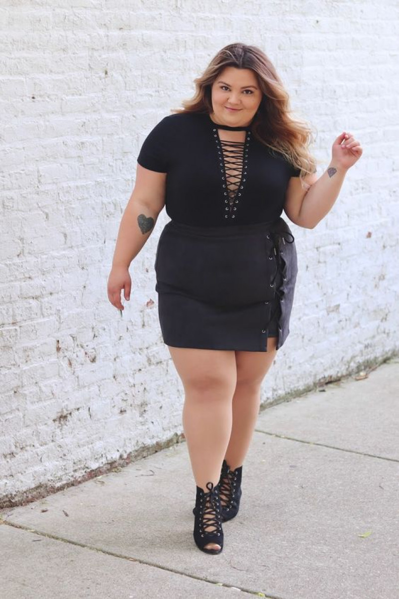 fashion model, little black dress, long hair, black formal skirt skirt, black t-shirt, dark blue and navy elegant boot chelsea and ankle boot