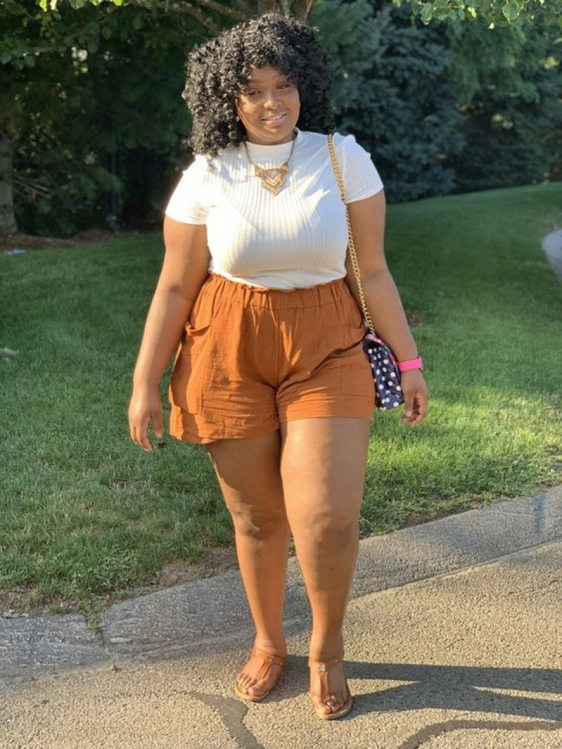 plus size shorts, crop top, white t-shirt, orange formal trouser, beige flip-flop, beige sandal