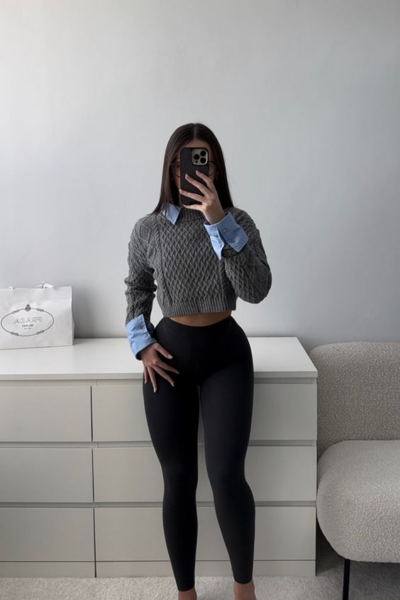 standing, black casual legging, grey sweater
