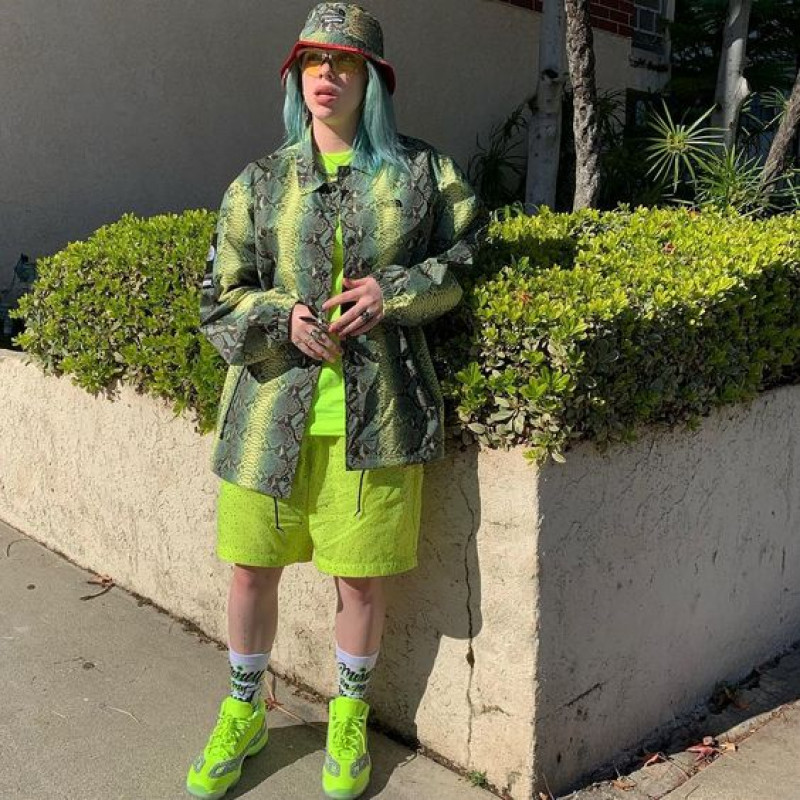 Billie Eilish Feet in neon shoes