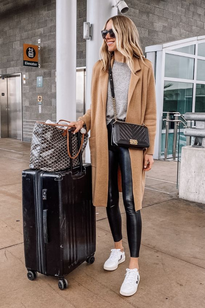 airplane outfit 2023, gate check bags, travel fashion, beige kimono coat, blue sportswear legging, white trainer, white sneaker