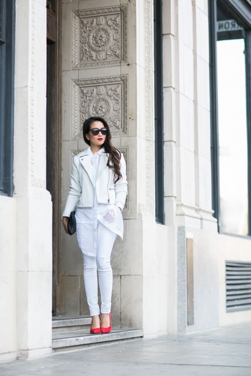white cropped jacket outfit, crop top, white biker jacket, white casual trouser, red pump