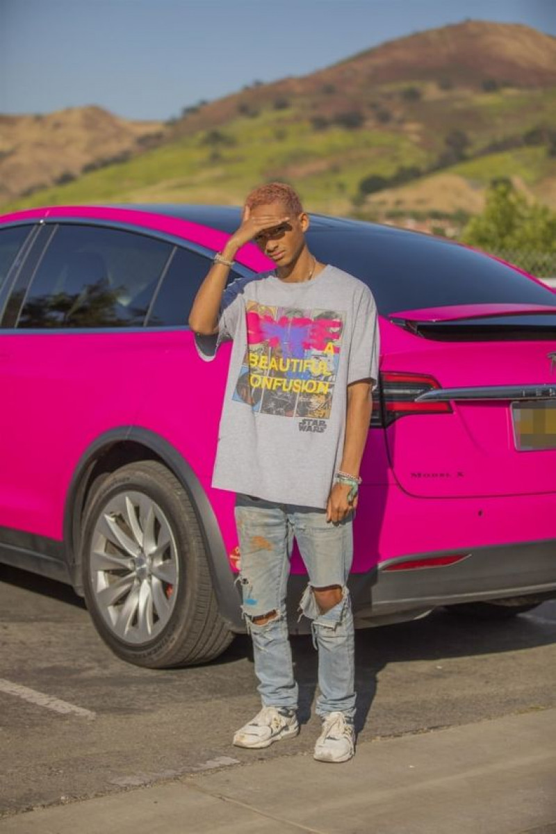 jaden smith car, celebrity street style, jaden smith, luxury car, light blue casual trouser, white trainer