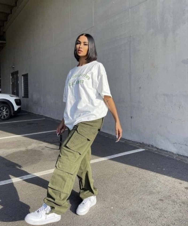Oversized white t-shirt with olive green cargo pants