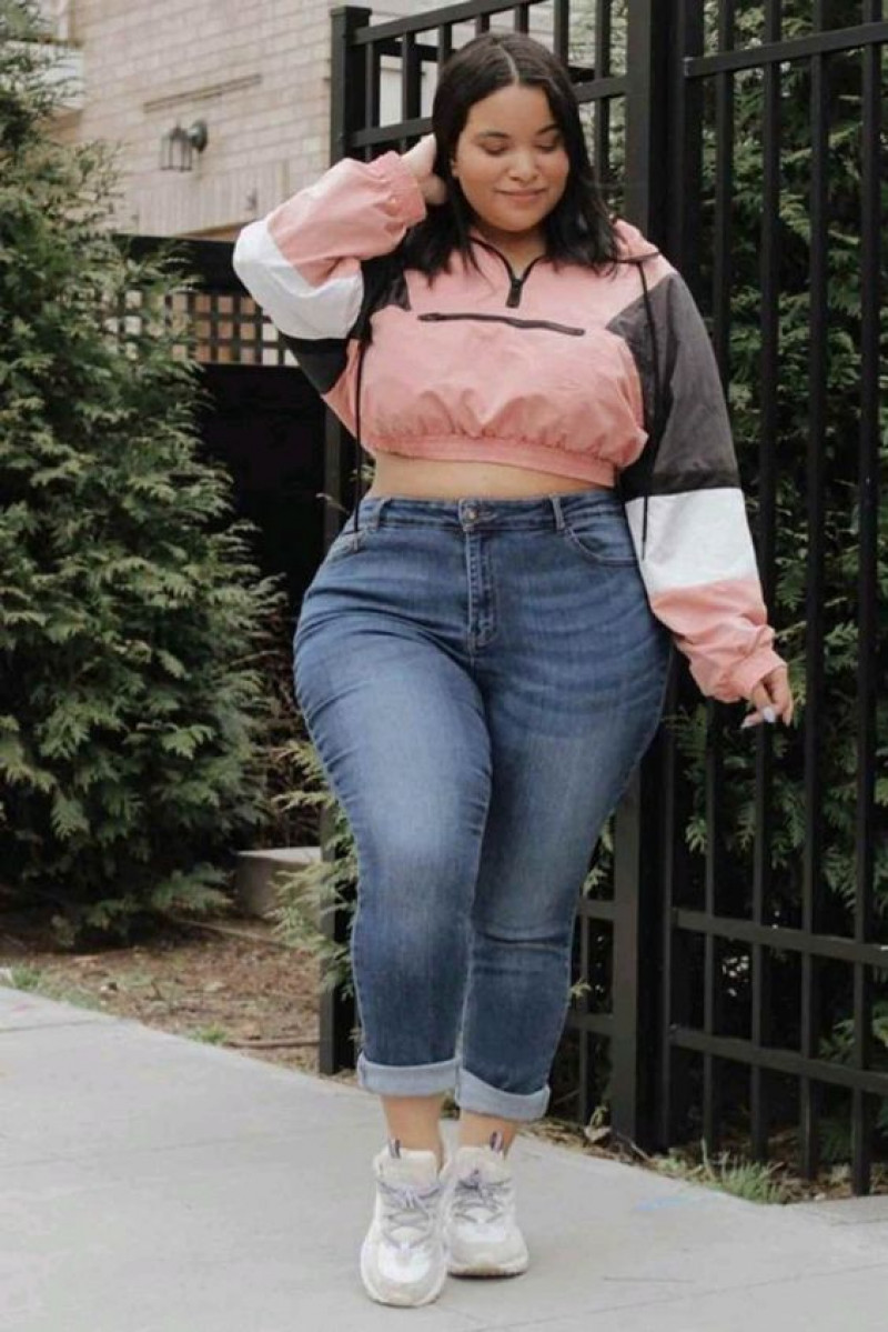 plus size outfits, plus-size clothing, online shopping, plus size dress, clothing sizes, seasonal sale, pink sweater, light blue casual trouser, white trainer