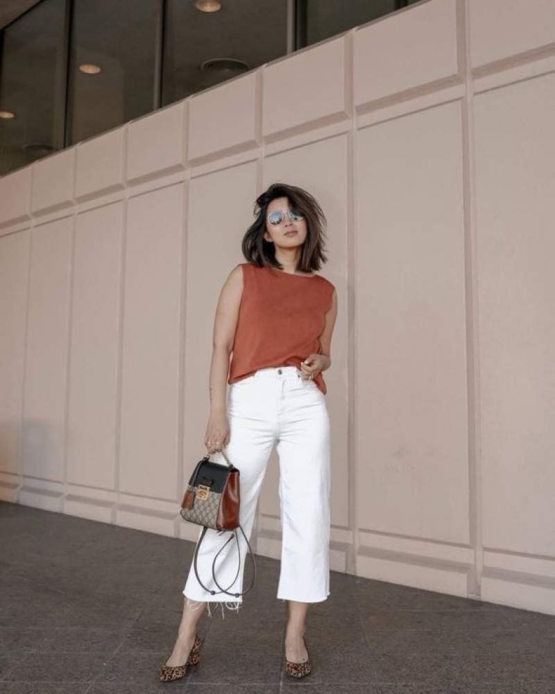 cargo pants, orange shell top, beige pump