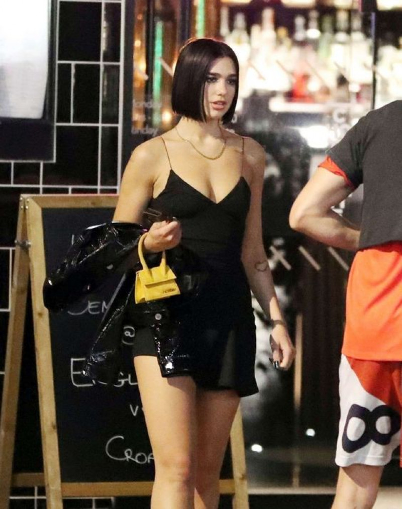 Dua Lipa In Black Cleavage Dress