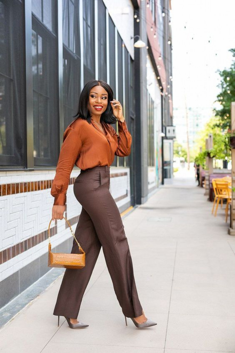 brown formal trouser, orange sweater, grey pump