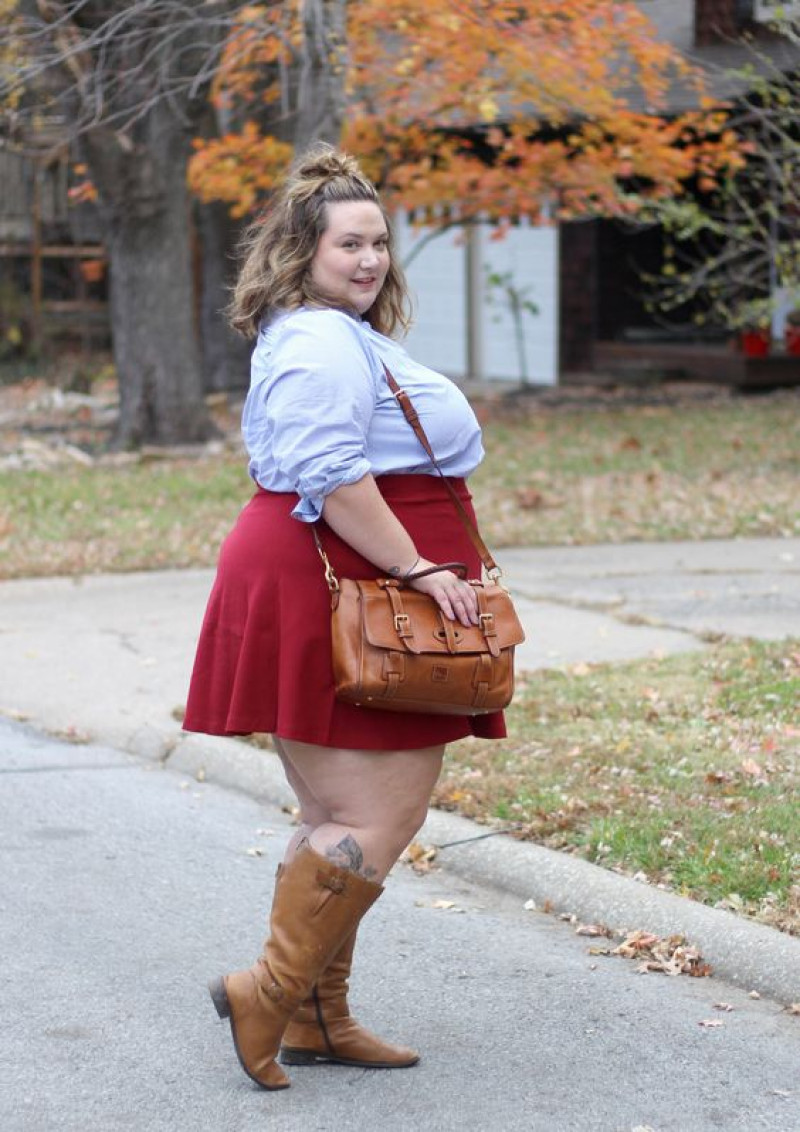 footwear, red pleated skirt skirt, brown ladies high boot, white blouse